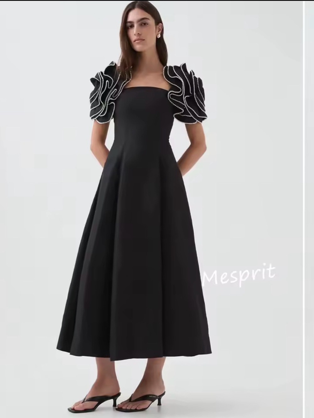 Elegant Black Midi Dress with Statement Ruffle Sleeves